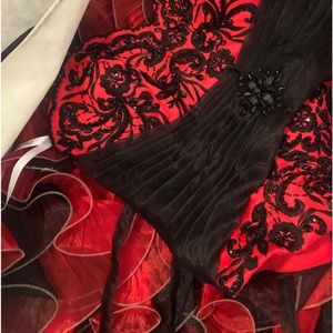 Red and black Quinceañera dress.